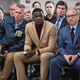 Waffle House patron James Shaw Jr. (center), who disarmed the gunman in the fatal mass shooting at a Tennessee Waffle House, appears at a press conference with FBI agents and Metro Nashville Mayor David Briley (right) April 22, 2018, in Nashville, Tenn.